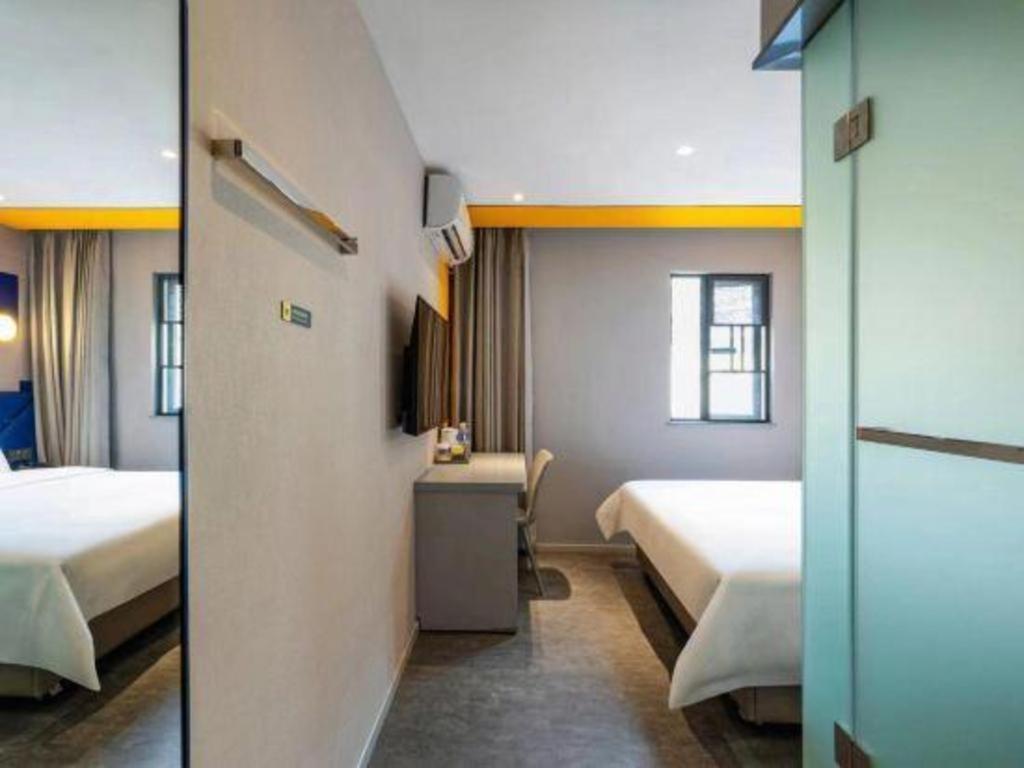 7 Days Inn Chengdu Sichuan University South Railway Station Bagian luar foto